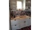 Rustic travertine stone kitchen sink with a trough