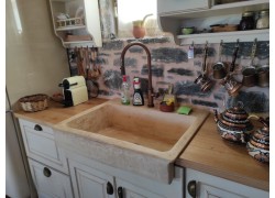 Rustic travertine stone kitchen sink with a trough