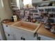 Rustic travertine stone kitchen sink with a trough