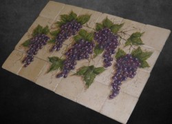 Kitchen/bathroom performances with handmade Travertine decor tiles Grapes.